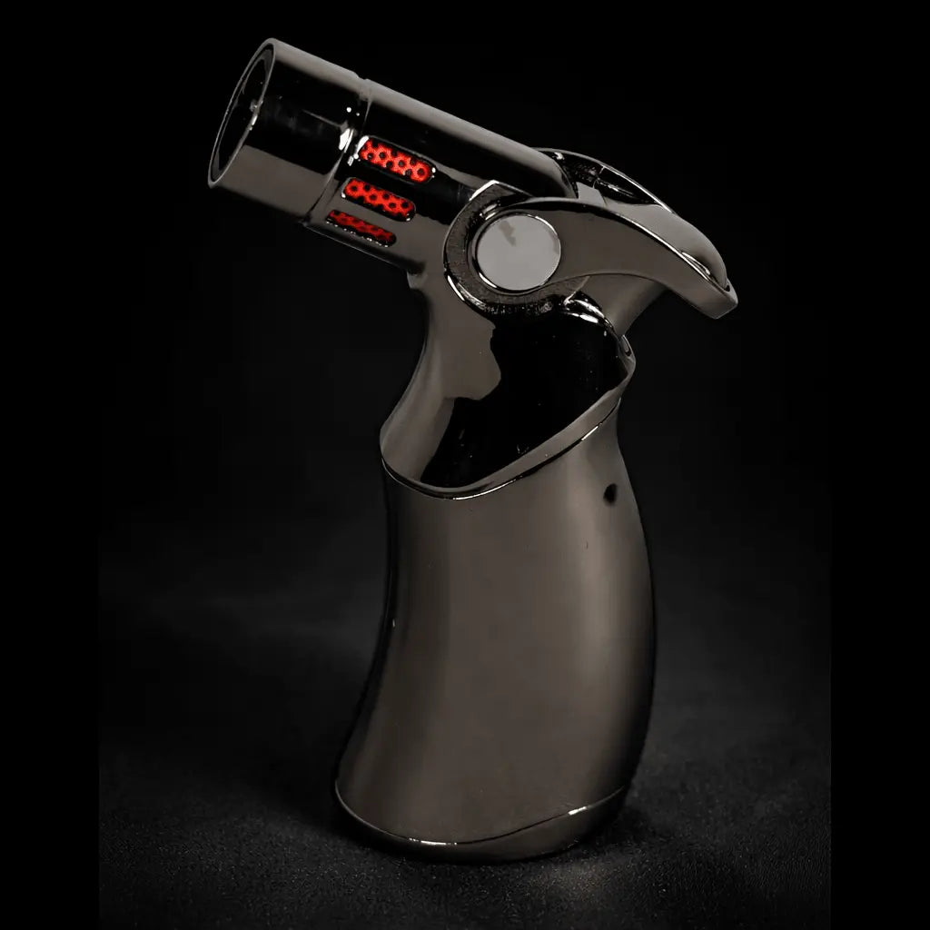 Chrome torch lighter on a black background