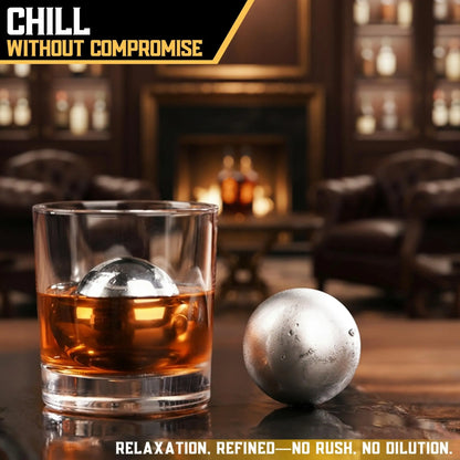 G & J's Finest premium whiskey balls gift set with four whiskey balls, pouch, and tongs arranged on a wooden surface.