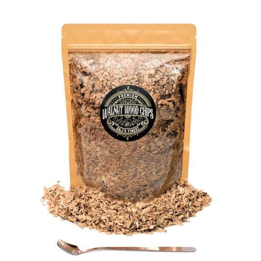G & J's Finest walnut wood chips in a heap, showcasing rich brown color and textured wood pieces for smoking and grilling.