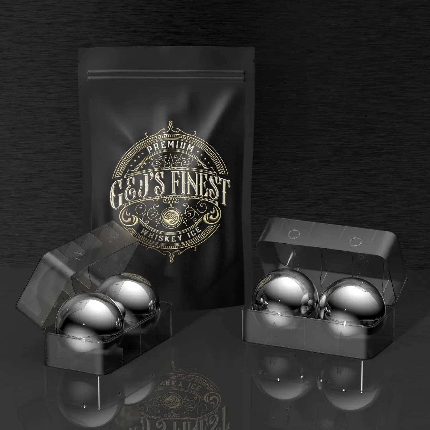Premium XXL 55mm stainless steel whiskey balls by G & J's Finest, showing shiny, smooth metal cubes for chilling spirits.